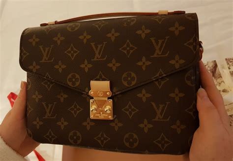 como saber si una cartera louis vuitton es original